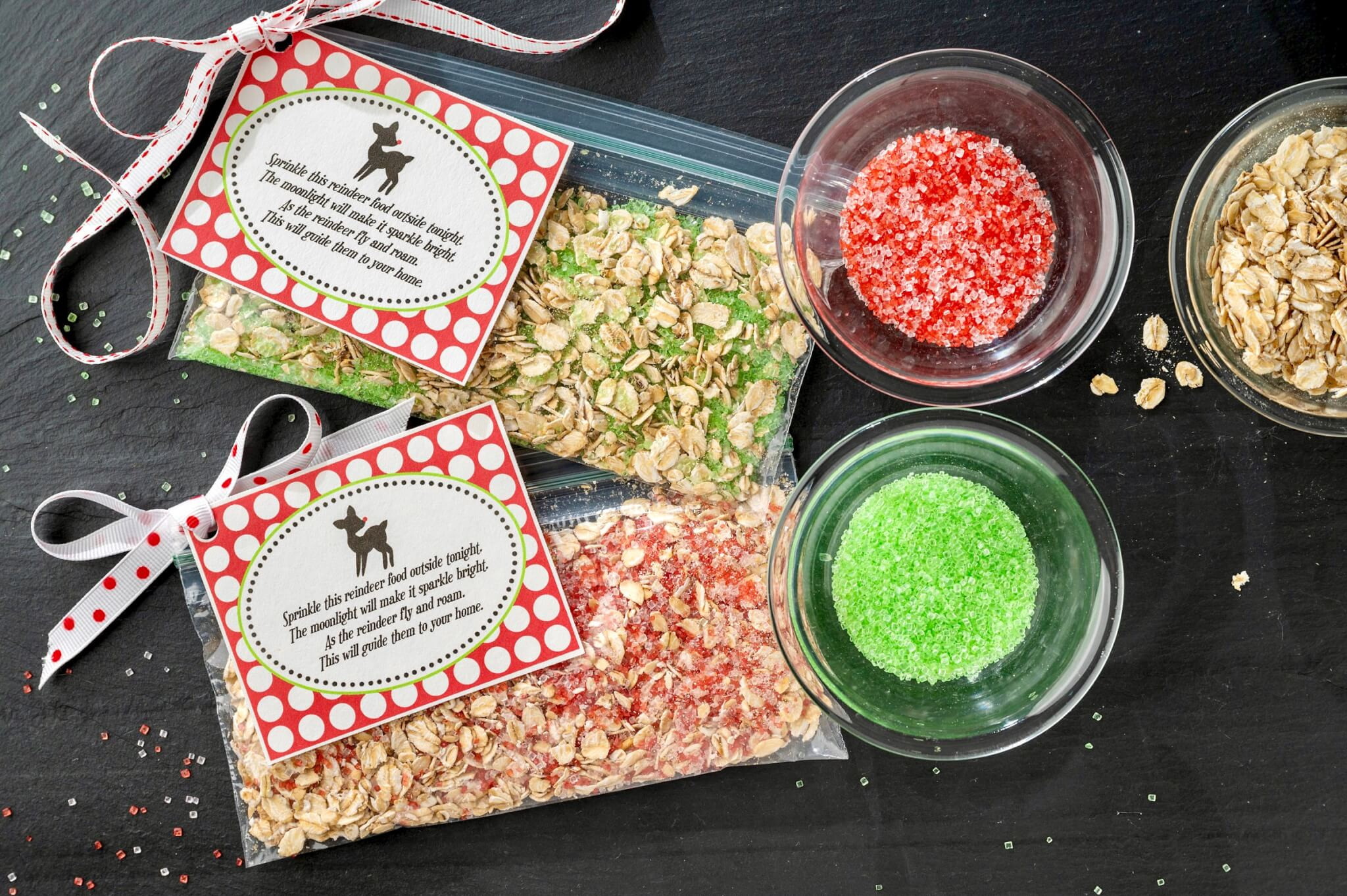 Close up of a child's hands holding a bag of homemade reindeer food, showcasing the festive mix of oats and colorful sprinkles, perfect for a Christmas Eve activity.