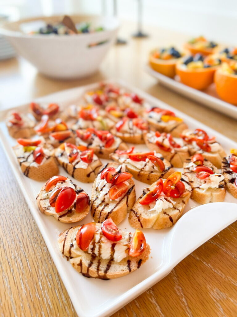 Baby shower fruit platter in orange rind halves.