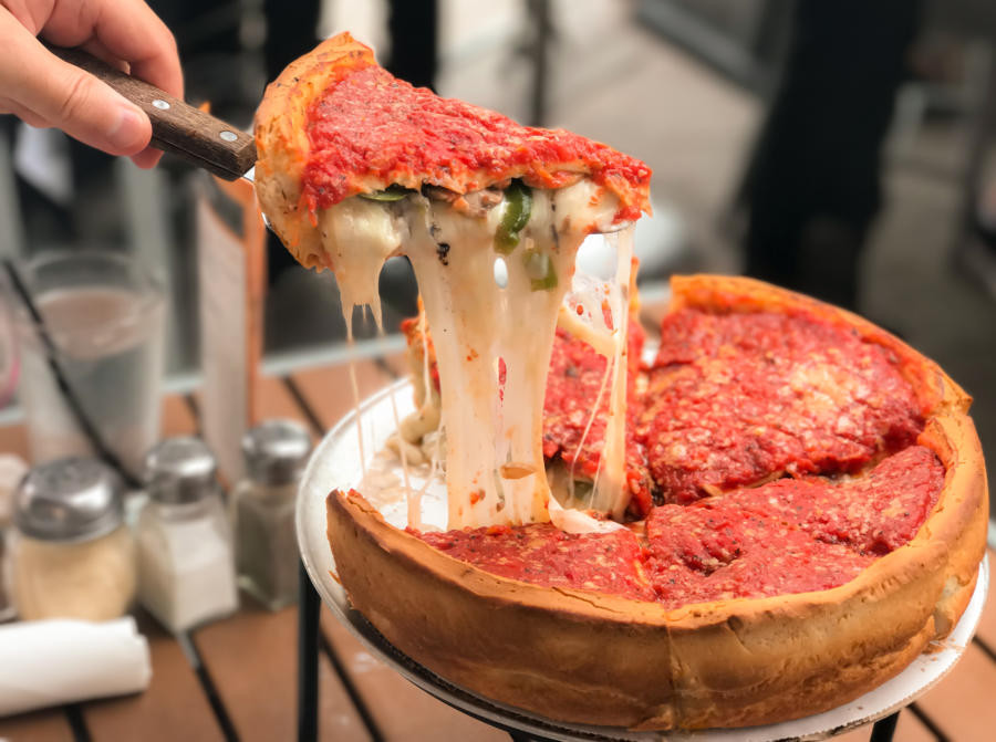 Chicago Deep Dish Pizza with melted cheese and thick tomato sauce