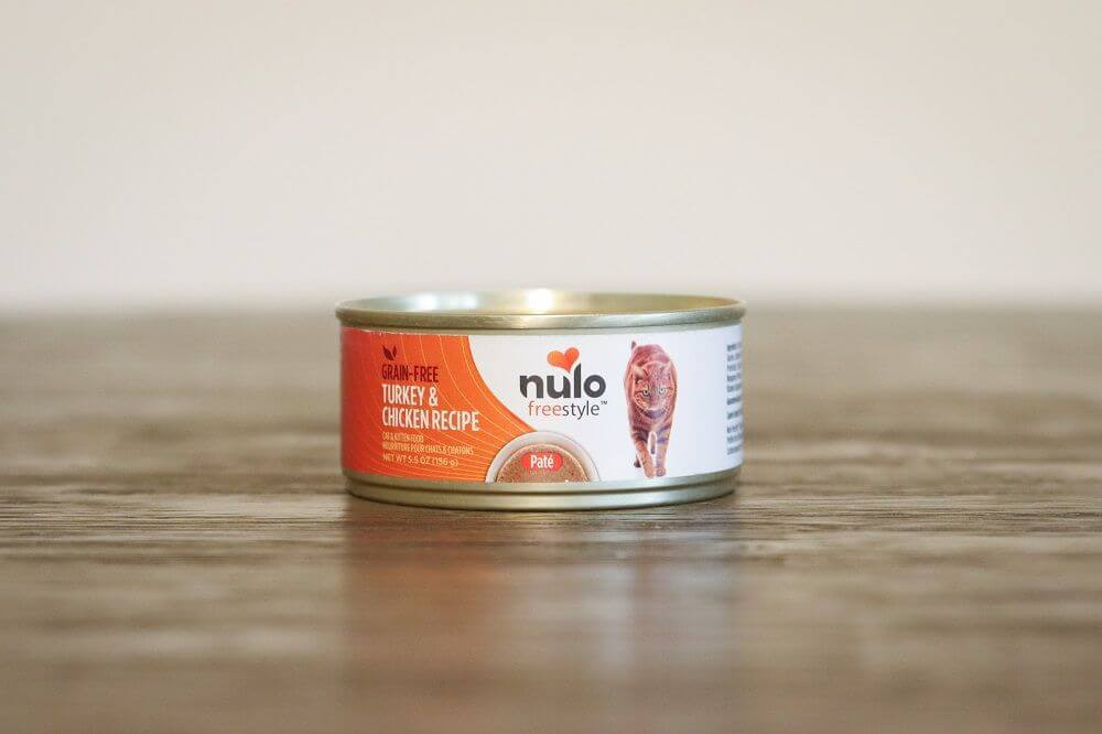 Close-up of Nulo Freestyle Turkey &amp; Chicken Recipe canned food, showing the pate texture and rich color.