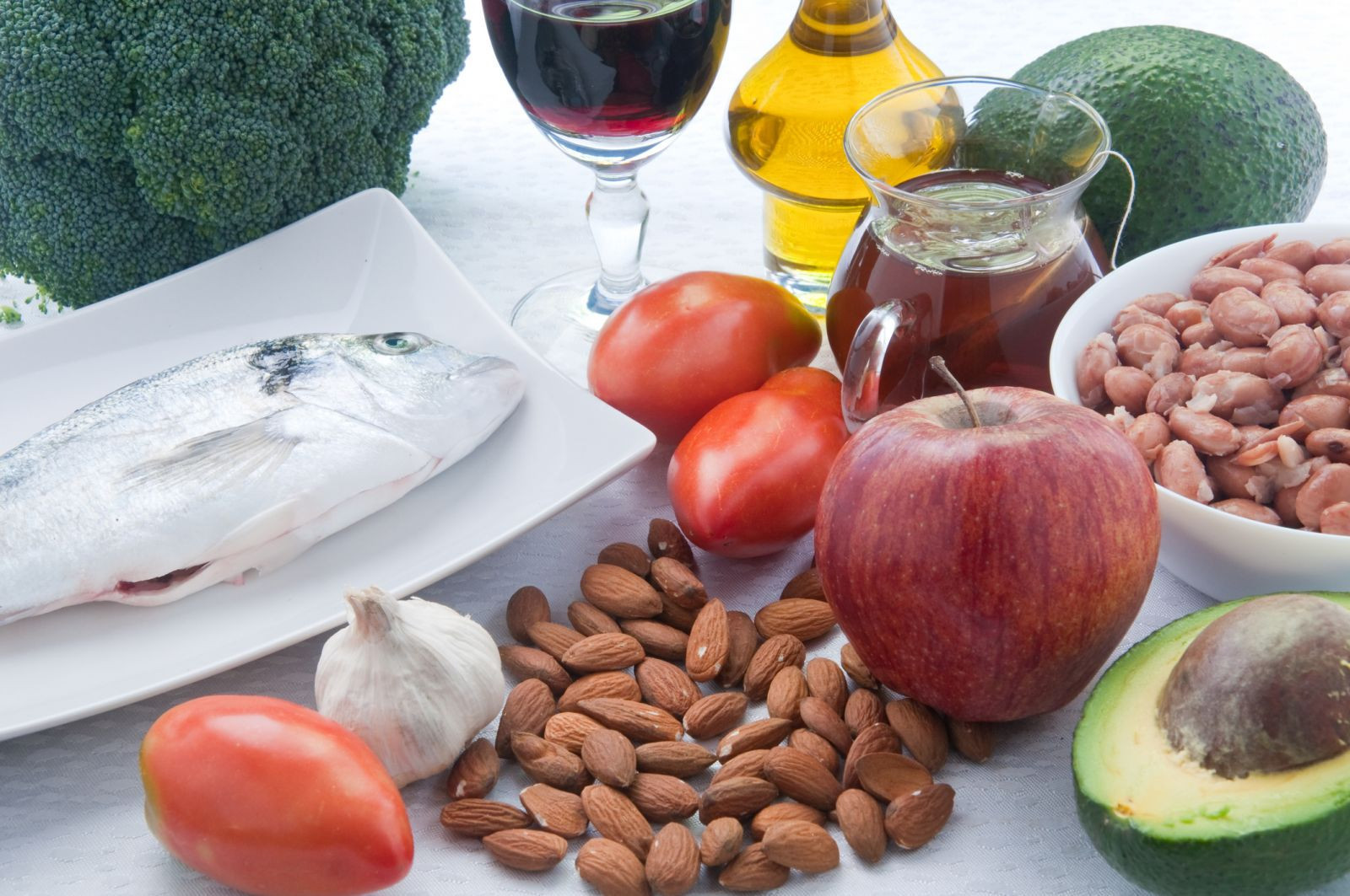 Various foods that are good for lowering cholesterol like nuts, beans, fruits, and vegetables