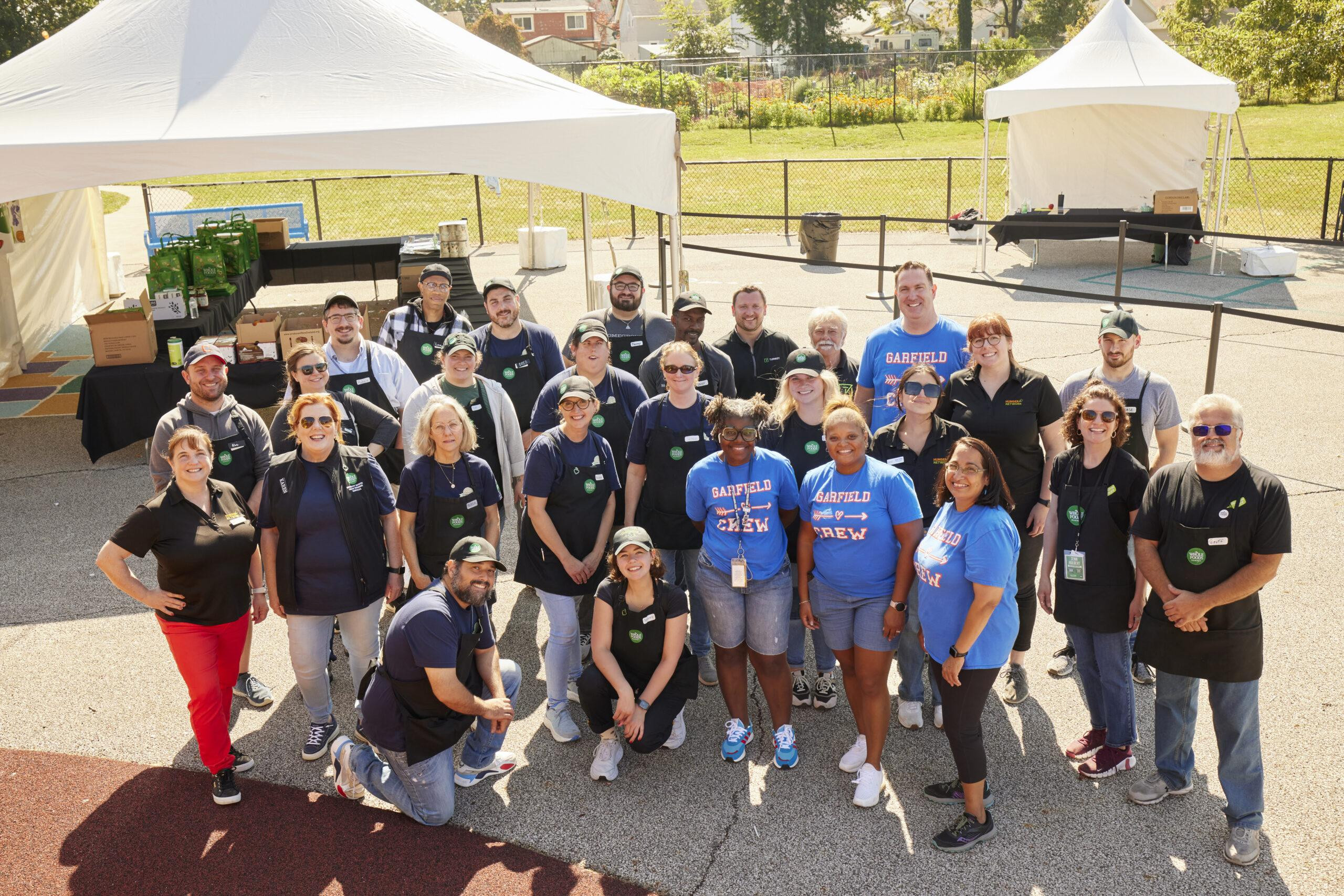 Whole Foods Market employees volunteering.