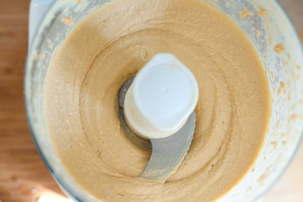 Extra smooth hummus after processing all ingredients.