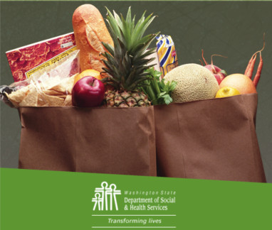Woman shopping for groceries with an EBT card, emphasizing healthy food choices like fruits and vegetables