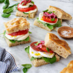 Caprese Sandwich with juicy tomatoes, creamy mozzarella, and fresh basil on crusty bread