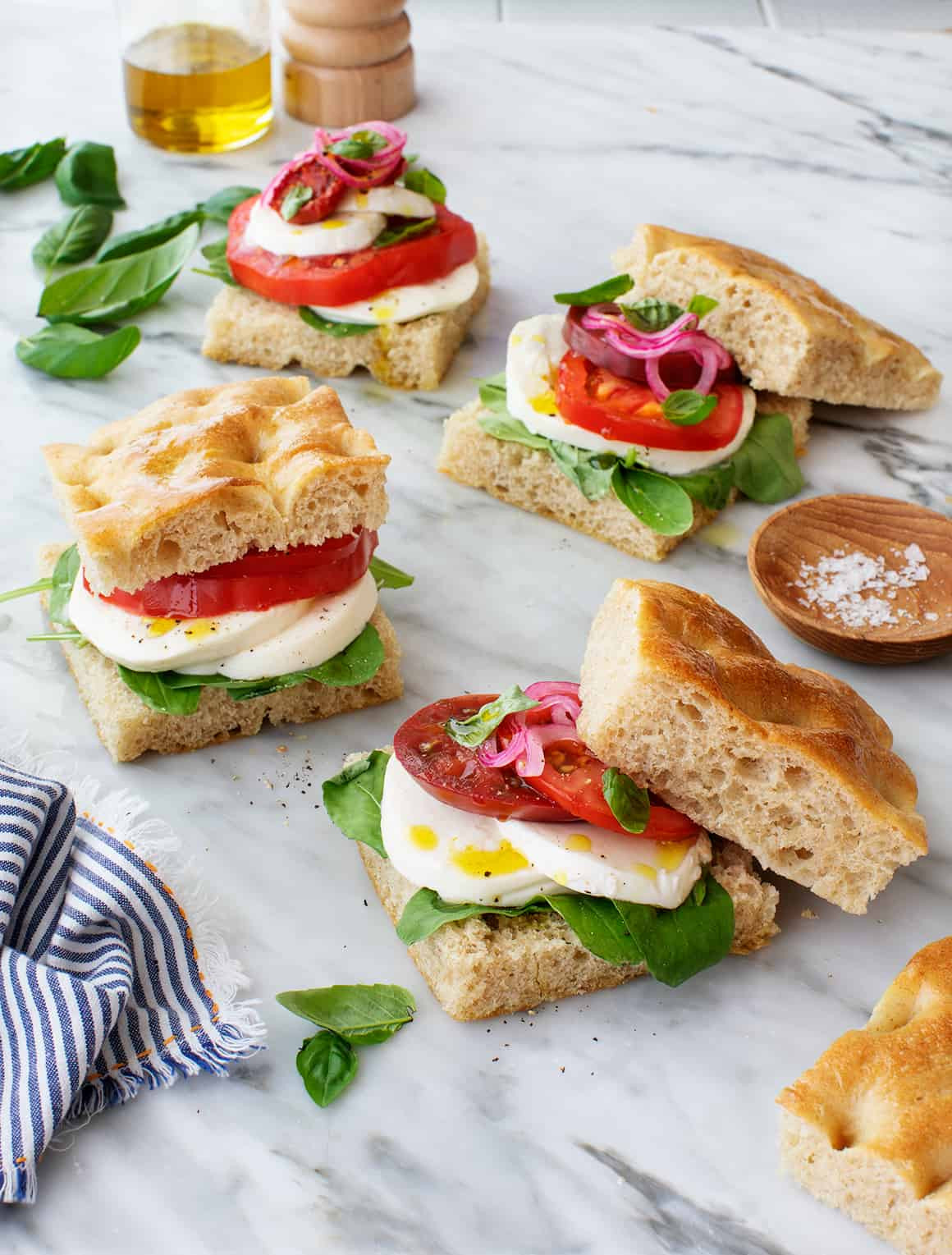 Caprese Sandwich with juicy tomatoes, creamy mozzarella, and fresh basil on crusty bread