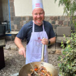 Cooking lomo saltado in a wok at Palacio del Inka hotel in Cusco, Peru