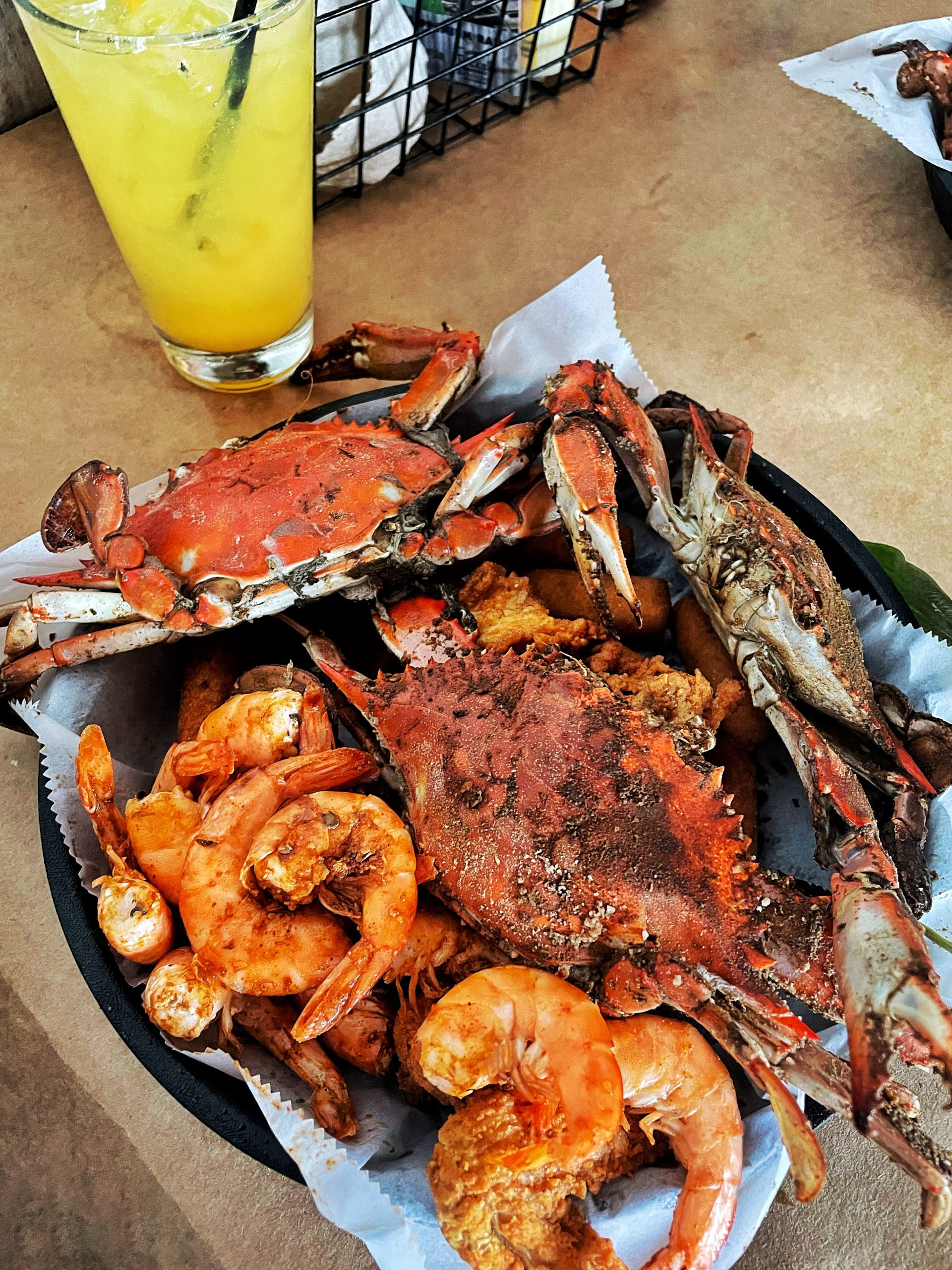 A delicious Baltimore crab feast with steamed crabs seasoned with Old Bay.