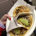 Assortment of tacos from Los Tacos No. 1, showcasing affordable Mexican cuisine