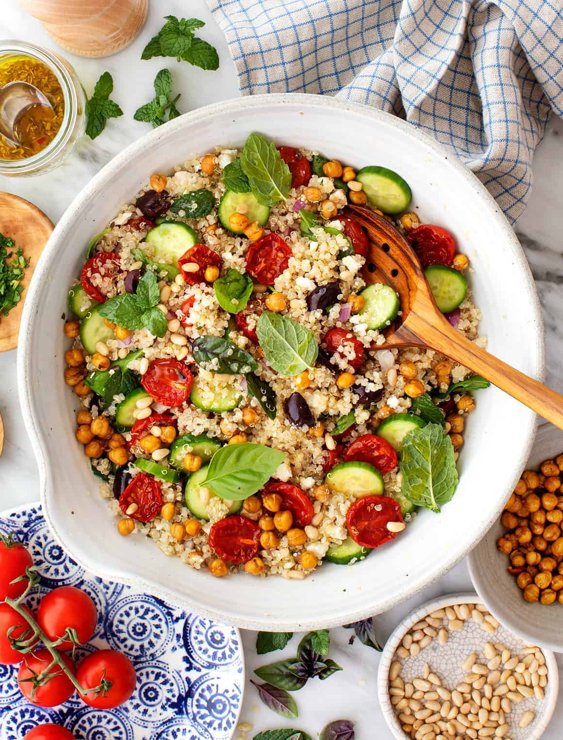 Selection of prepped salads in jars, showcasing layers of fresh vegetables, grains, and dressings, perfect for quick and healthy lunches