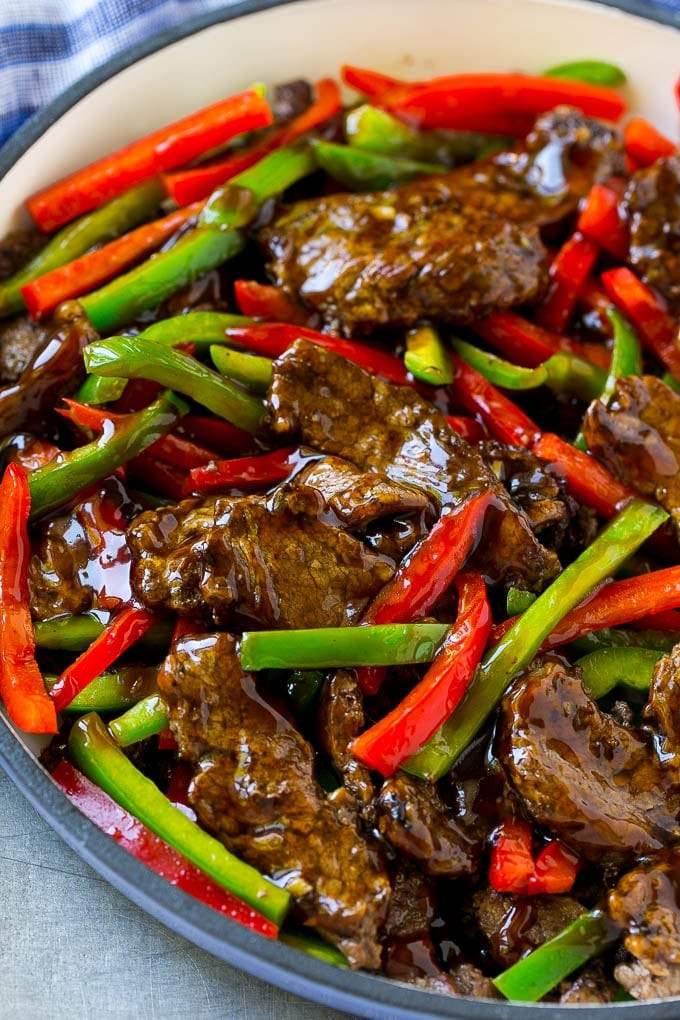 Pepper steak stir fry with thinly sliced steak and colorful bell peppers, showcasing the dish's vibrant appearance and delicious appeal.