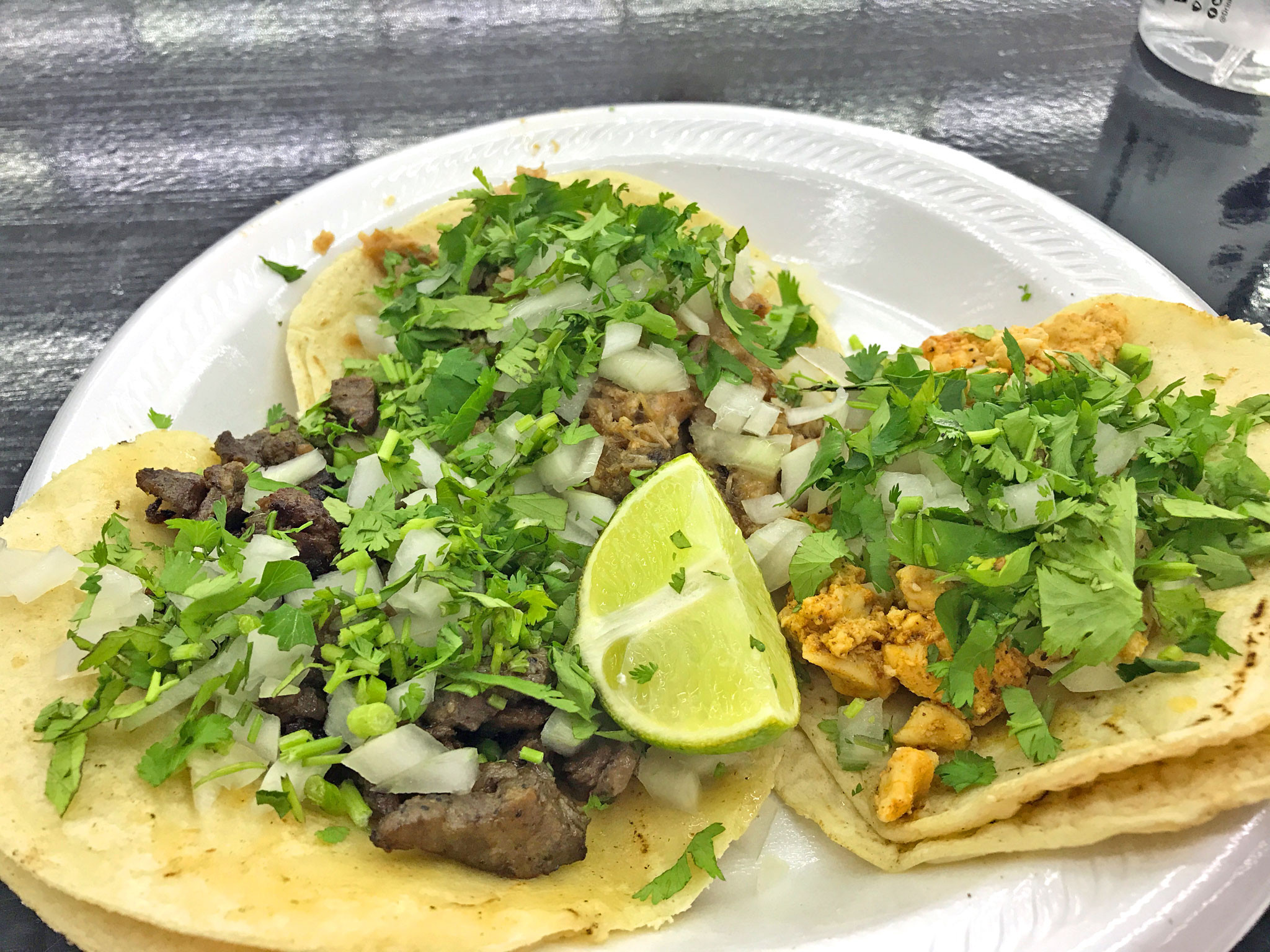 Steak, Pork, and Chicken Tacos at Chile Verde. Tacos Mexicanos are done traditional Mexican-style with just meat, chopped onions, and cilantro.