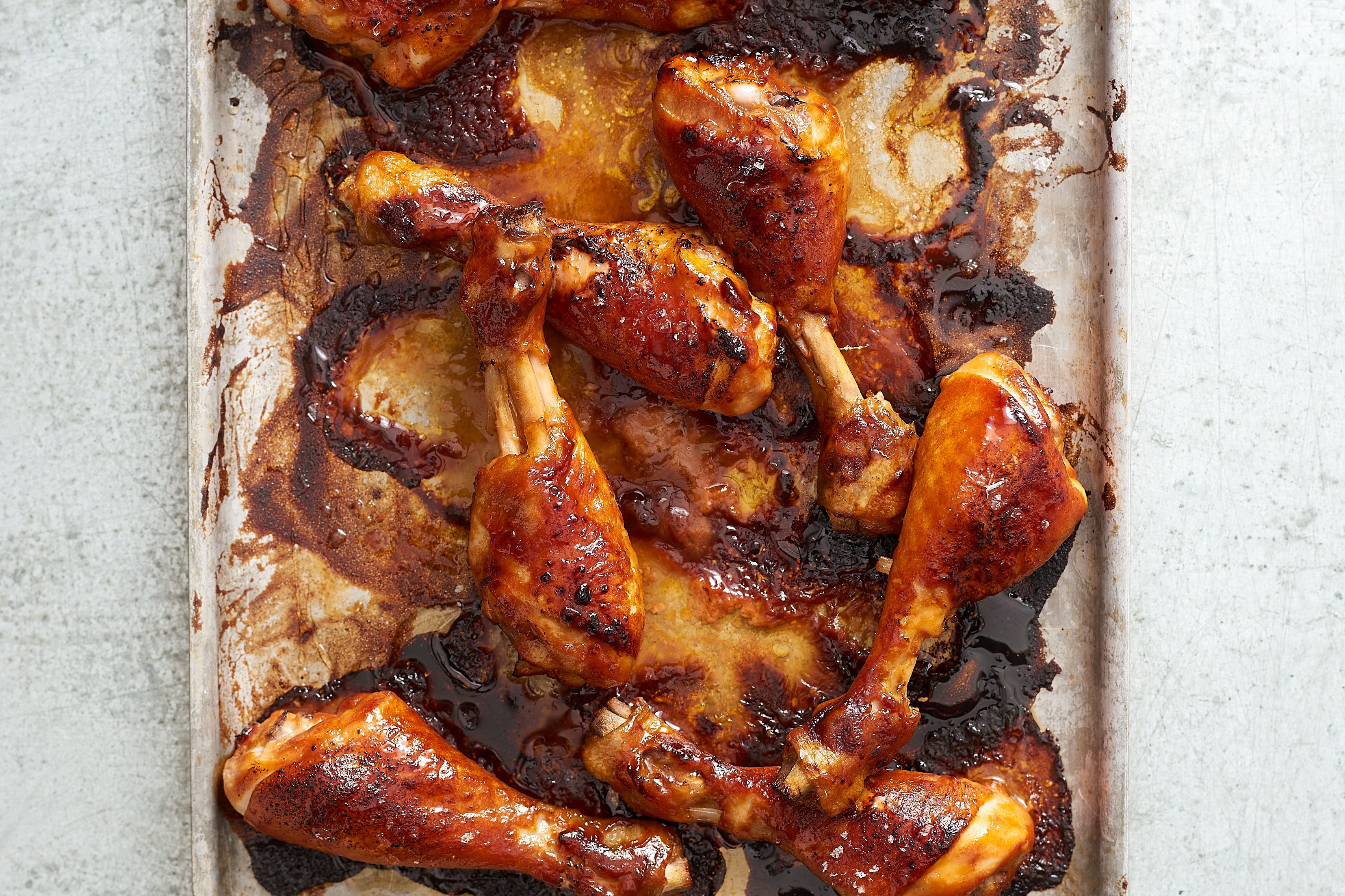 Sticky chicken on a baking tray