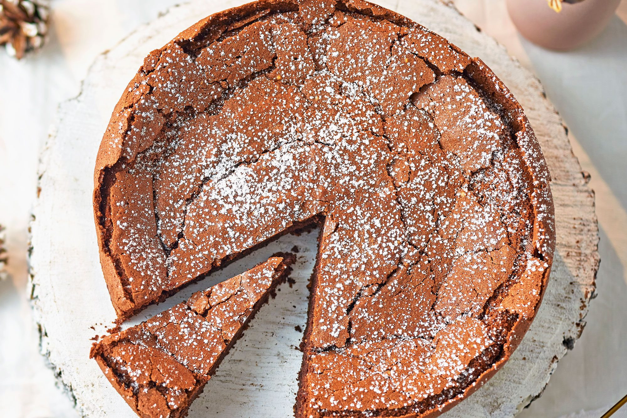 Sunken chocolate cake offers a rich, gluten-free dessert option, perfect for those keeping kosher and reflecting the Hanukkah focus on oil.